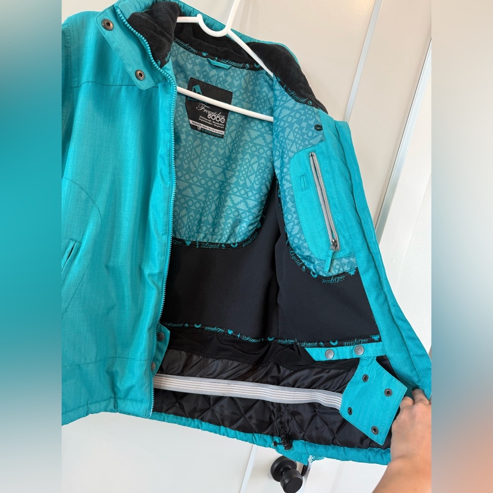 Women’s Liquid Freerider 8000 MM Waterproof Teal Hooded Ski Snowboard Jacket - Picture 3 of 12